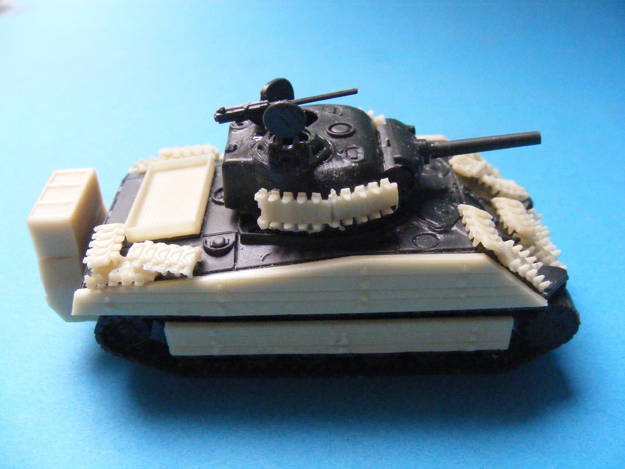 Sherman in Pacific - uparmored with wood & tracks